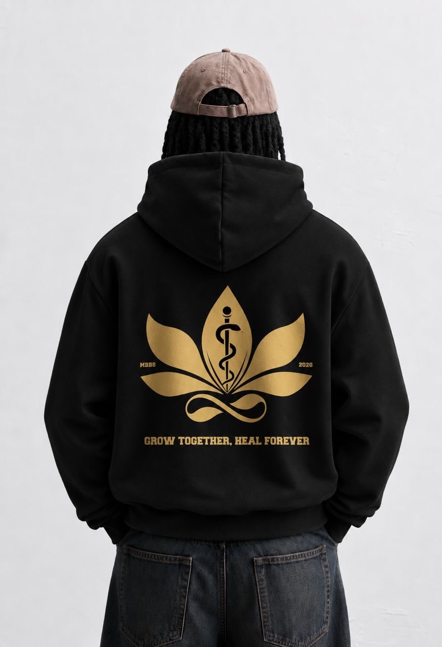 Lotus ’26 hoodie, black, back: the lotus and staff mark in gold, MBBS 2026