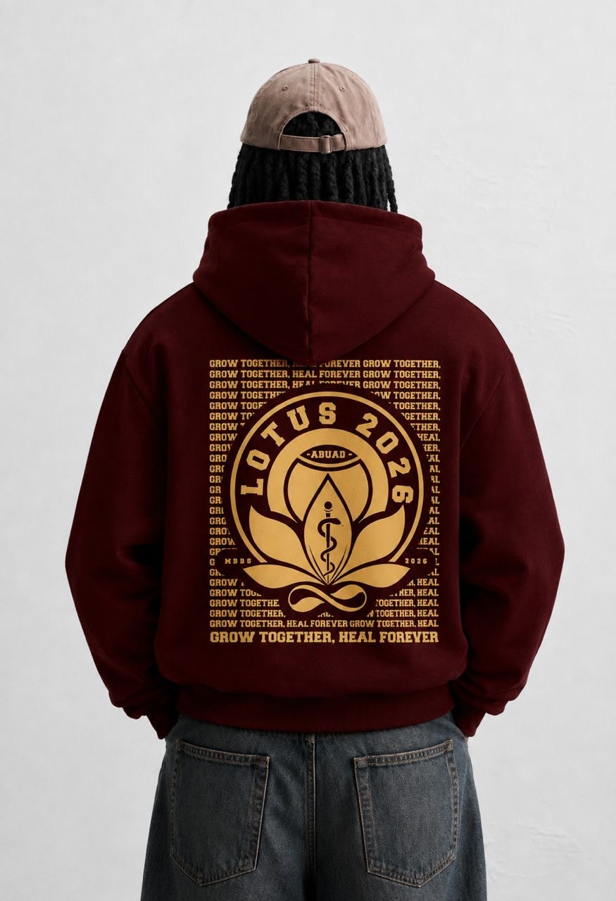 Lotus ’26 hoodie, maroon, back: the LOTUS 2026 ABUAD seal over repeated “Grow together, heal forever”